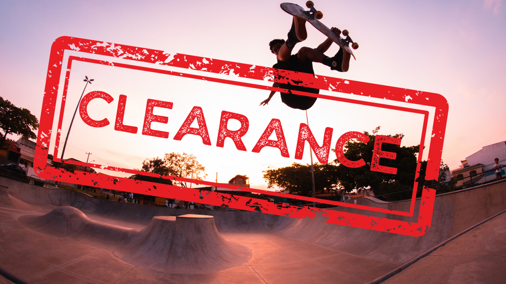 Guy skating in a skate park with a stamp across the image saying CLEARANCE, get your deals for TTWM Surf and Skate here! 