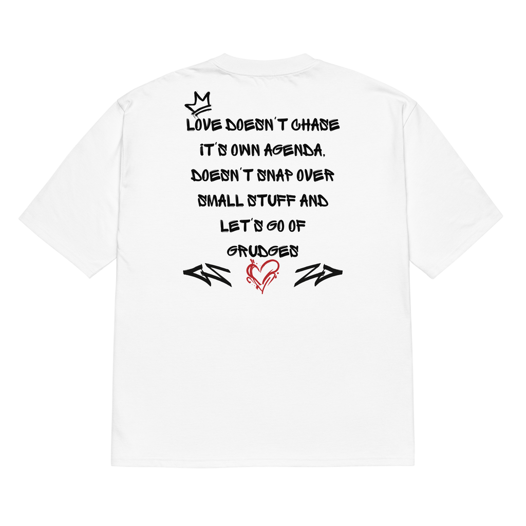 White oversized street tee with graffiti-style lettering on the back, and raw, hand-tagged "Love is in the Air" artwork on the front. A bold statement in urban fashion.