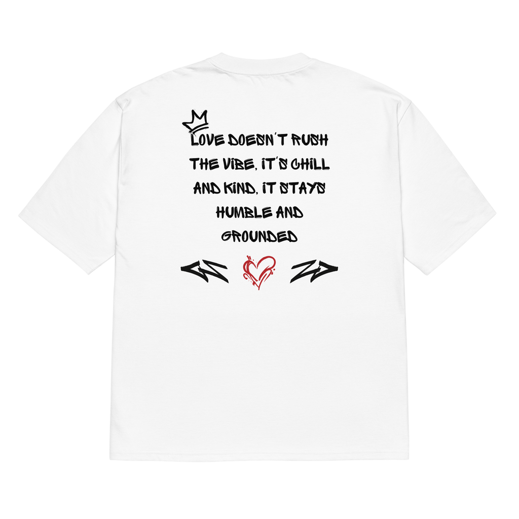 White oversized t-shirt featuring bold graffiti lettering on the back, and raw, street-style "Love is in the Air" tagging on the front. A statement in patience and real love.