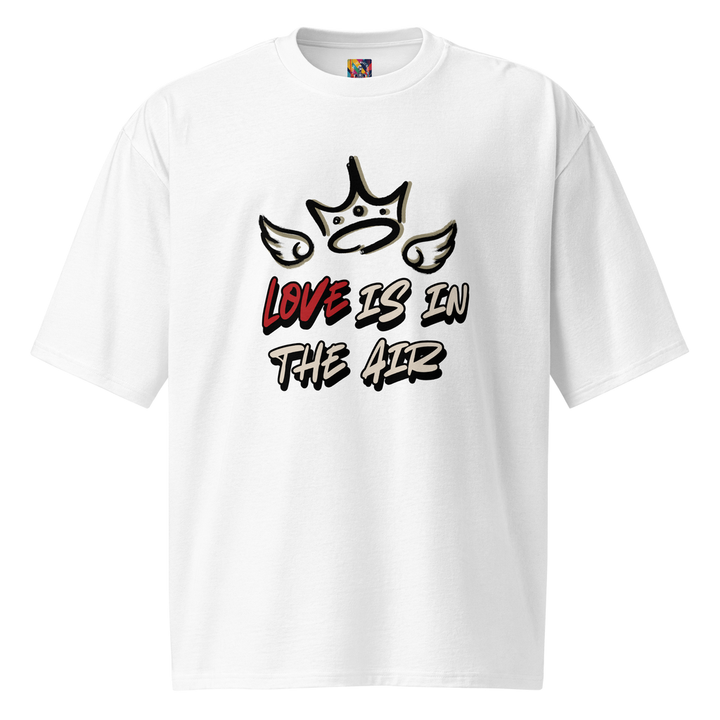 White oversized street tee with graffiti-style lettering on the back, and raw, hand-tagged "Love is in the Air" artwork on the front. A bold statement in urban fashion.