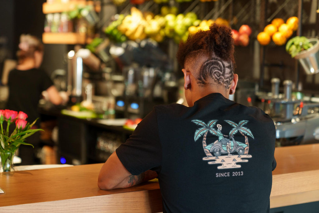 Jonathan WaveMaker Owner wearing surfin skelly since 2013, in a surf town juice bar in Florida